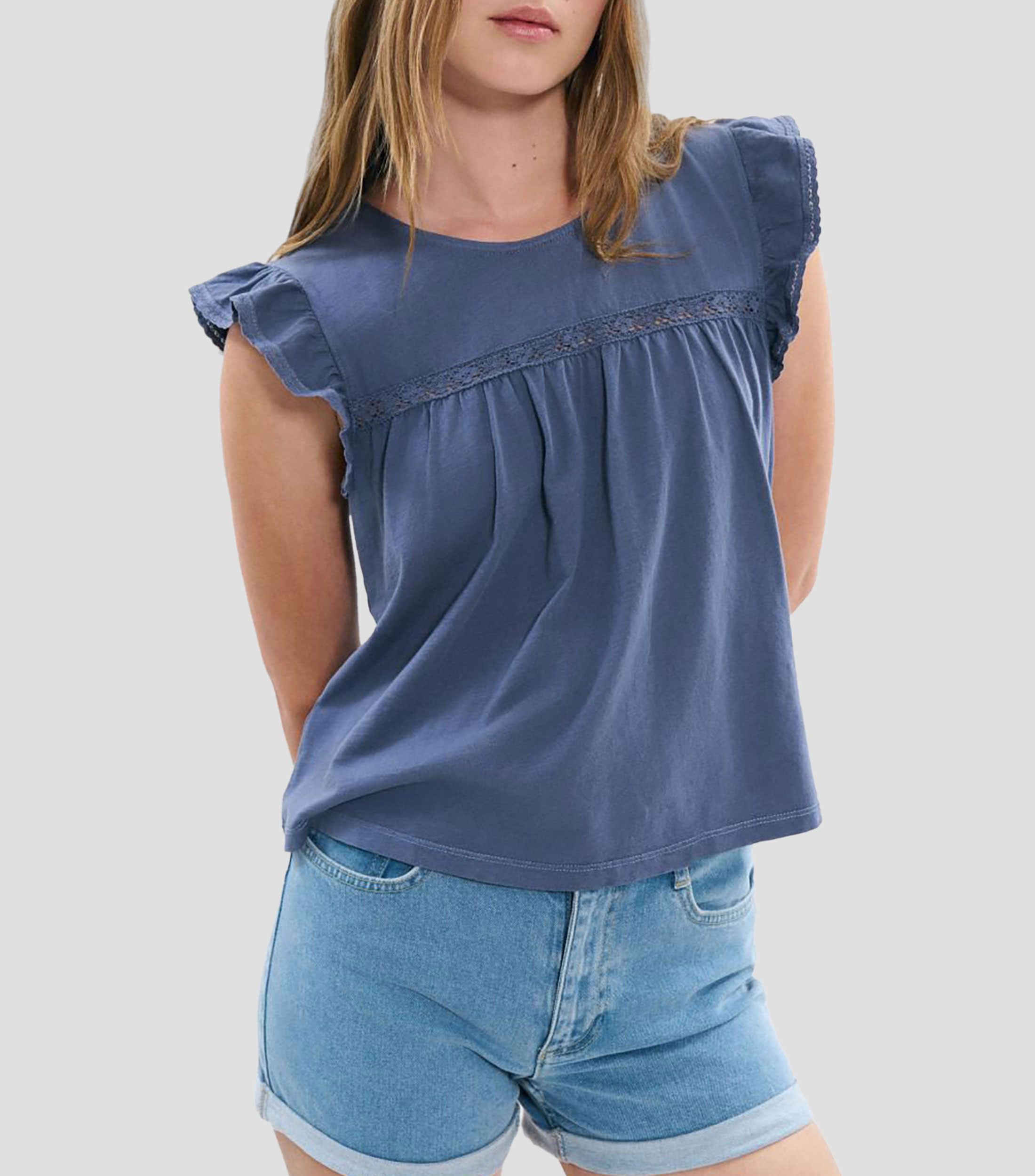 Blusa lisa sin mangas Mujer